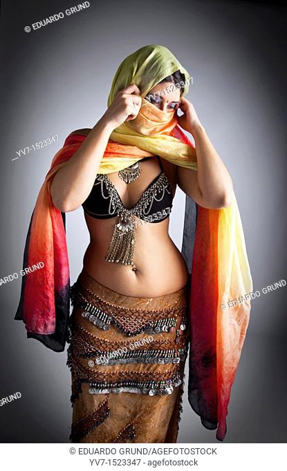 Beautifull belly dancer with veil
