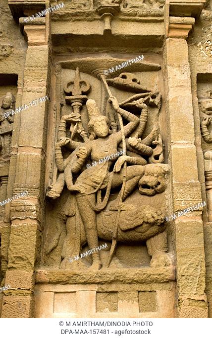Durga with Simhavahanam statue ; Kailasanatha temple in sandstones built by Pallava king Narasimhavarman & son Mahendra eight century in Kanchipuram ; Tamil...
