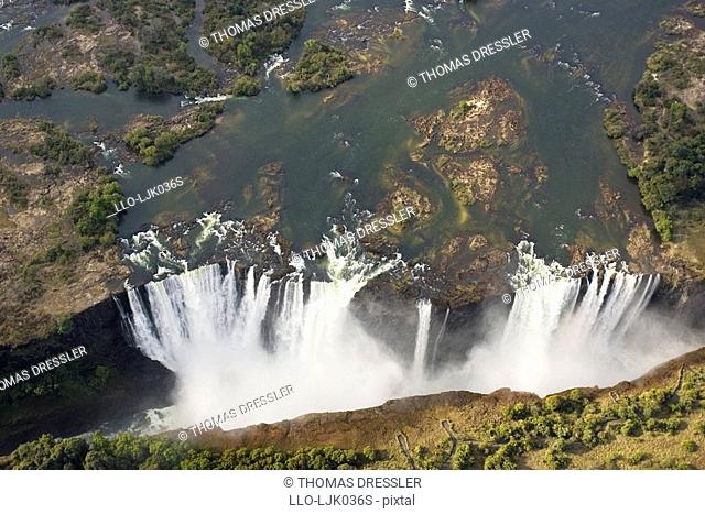 Aerial view of Zambezi River and the Victoria Falls on the border of Zimbabwe and Zambia