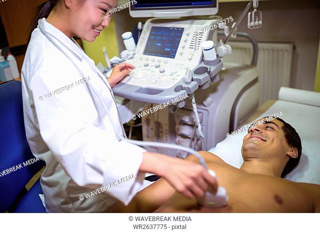 Male patient receiving a ultrasound scan on the chest