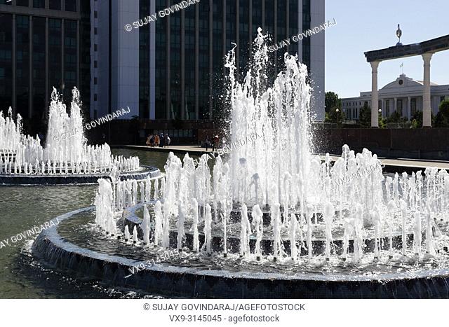 Tashkent, Uzbekistan - May 12, 2017: View of Independence Square, gate of independence and fountains, a famous landmark in the city and a major tourist...