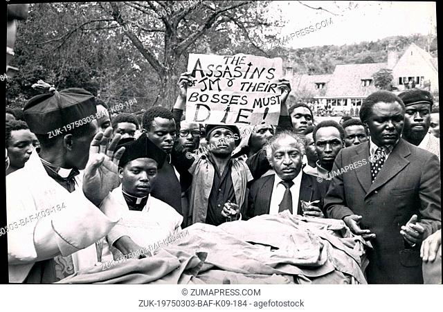 Mar. 03, 1975 - Kenya ?¢‚Ç¨‚ÄúNairobi, March 16, 1975 Josiah Kariuki funeral ?¢‚Ç¨‚Äú A University student hold aloft while grim faced MP?¢‚Ç¨‚Ñ¢s stand by the...
