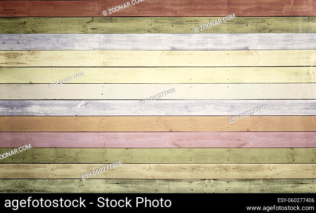 Colorful background image with a pattern of multi-colored horizontal stripes with an imitation of a painted wooden surface