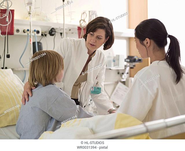Female doctor examining patient