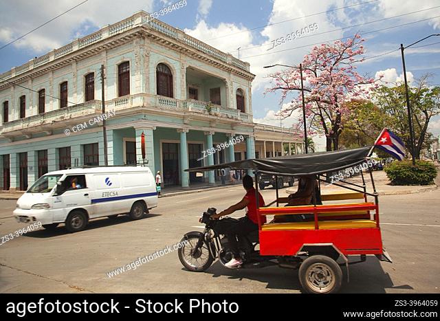 Vehicles in the main avenue-Paseo del Prado or so called Boulevard, Cienfuegos, Cuba, West Indies, Central America
