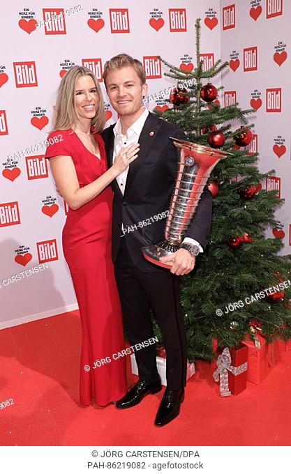 Nico Rosberg and his wife Vivian Sibold arrive for the charity event 'Ein Herz fuer Kinder' (lit. 'A hear for children' in Berlin, Germany, 3 December 2016