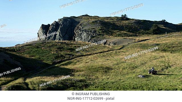 Person riding quadbike along Long Point Hiking Trail, Crow Head, Twillingate, North Twillingate Island, Newfoundland And Labrador, Canada