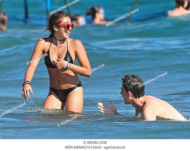Lourdes Leon, daughter of Madonna, spends time on the beach with a male companion during a summer holiday in Cannes, South of France Featuring: Lourdes Leon...
