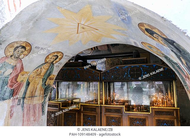 13.09.2018, Bulgaria, Batschkowo: Numerous candles can be seen in the Bulgarian-Orthodox monastery Batschkowo with the monastery church Maria Himmelfahrt