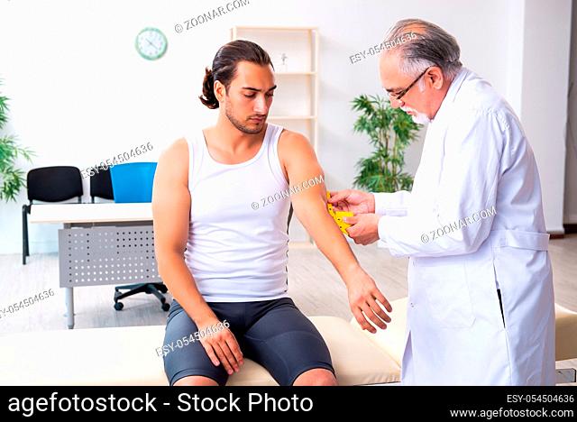 The young male patient visiting experienced doctor