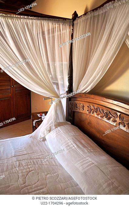 Nicoya Peninsula Costa Rica: four-poster bed at Tango Mar Resort, Playa Quizales