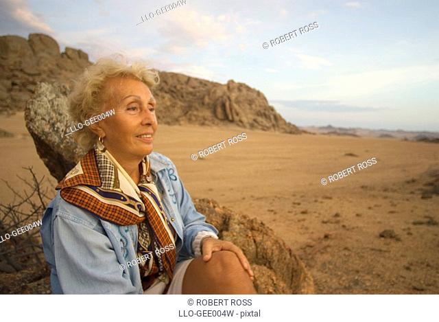 Mature Woman on a Desert Safari  Skeleton Coast, Kaokoland, Namibia, Africa