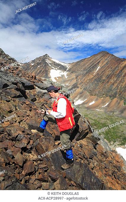 Geologist doing fieldwork, Hudson Bay Mountain, Smithers, British Columbia