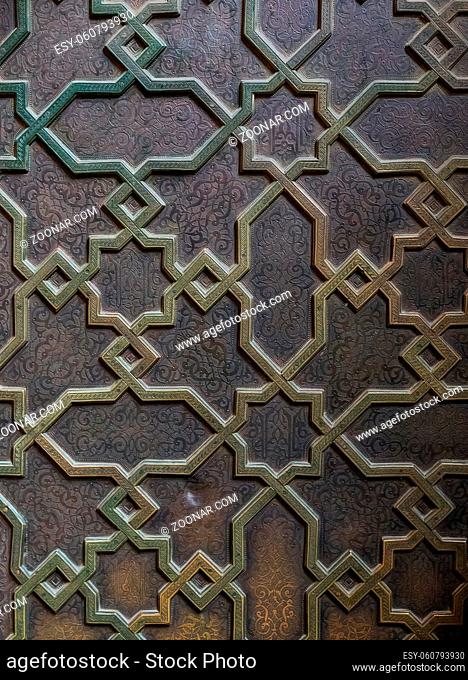 Traditional maroccan ornate metal door pattern background