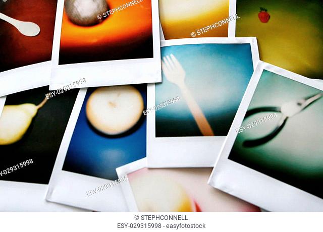 An image of old scratched and blurry polaroid pictures of everyday objects