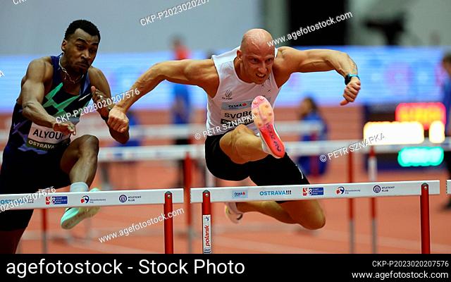 Petr Svoboda from Czech Republic, right, competes in men's 60 metres hurdles race during the Czech Indoor Gala athletics meeting of the silver category of the...