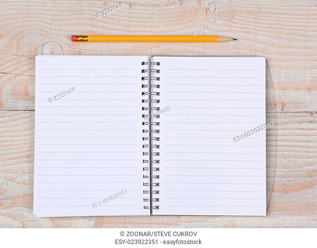 Open Notebook and Pencil