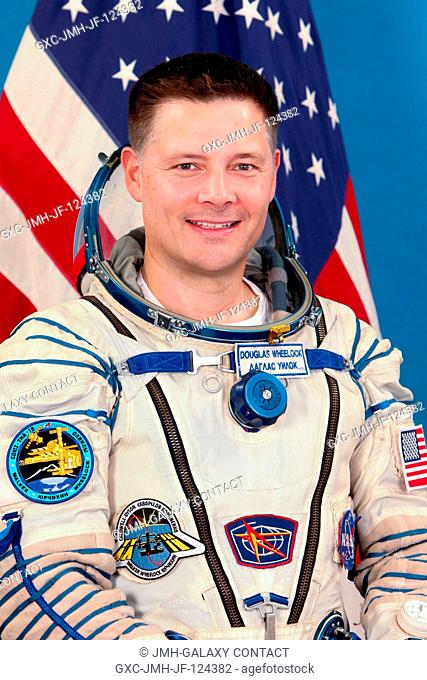 NASA astronaut Doug Wheelock, Expedition 24 flight engineer and Expedition 25 commander, attired in a Russian Sokol launch and entry suit