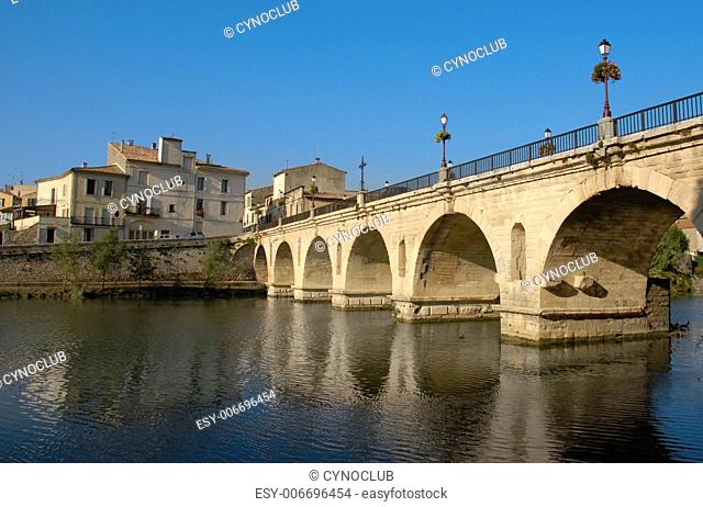 medieval bridge of sommieres, little town in gard, francebridge, architecture, medieval, town, city, village, old, france, french, river, water, landscape, gard