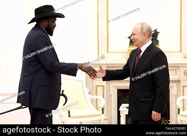 RUSSIA, MOSCOW - SEPTEMBER 28, 2023: South Sudan's President Salva Kiir Mayardit (L) and Russia's President Vladimir Putin shake hands during a meeting at the...