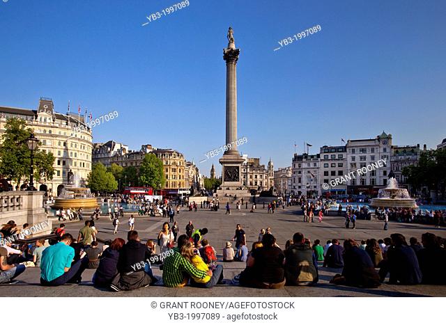 Tourists in Trafalgar Square, London, England