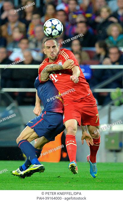 Barcelona's Daniel Alves and Munich's Franck Ribery (front) vie for the ball during the UEFA Champions League semi final second leg soccer match between FC...