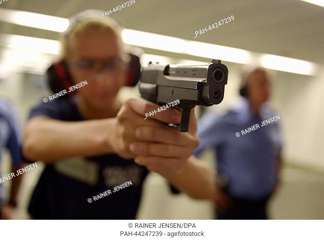 Police students practice at a shooting range at the state police school in Berlin,  Germany, 18 November 2013. A meeting of the internal affairs committee of...