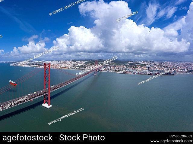 red bridge 25 april over river tagus sunny day cloud drone city landscape