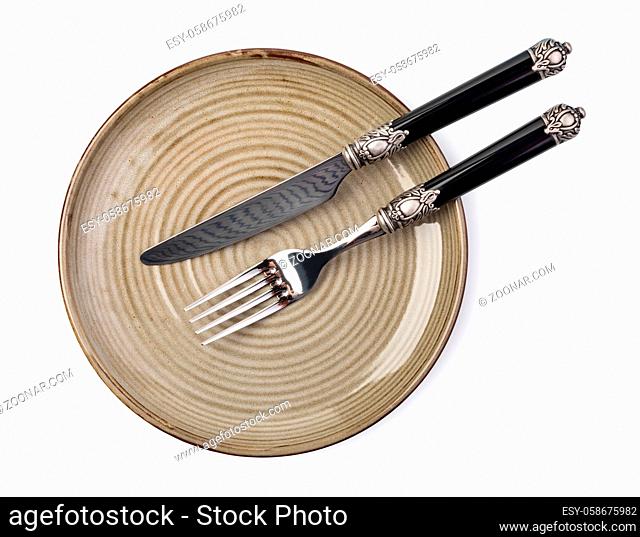 Plate and cutlery. Isolated on white background