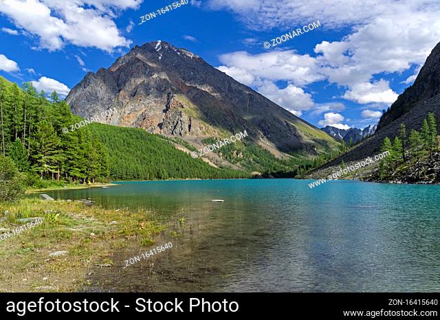 The large (lower) Shavlinsky lake. Altai Mountains, Siberia, Russia. August