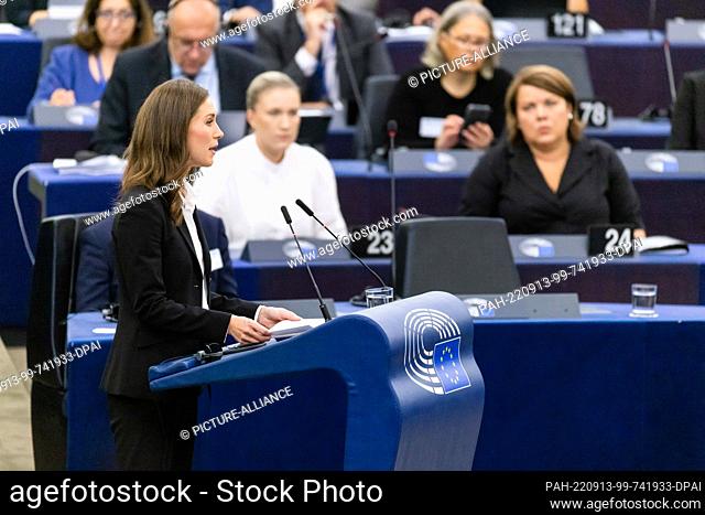 13 September 2022, France, Straßburg: Sanna Marin (SDP), Prime Minister of Finland, stands in the European Parliament building and speaks