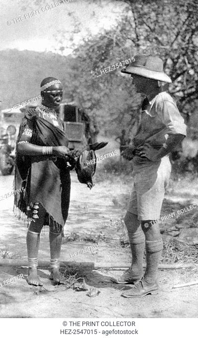 Errol Hinds making a deal in chickens, Wankie to Victoria Falls, Southern Rhodesia, 1925 (1927). Errol Hinds was Stella's younger brother