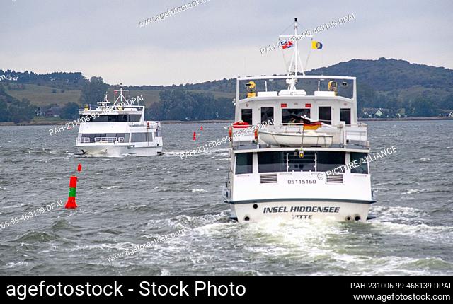 06 October 2023, Mecklenburg-Western Pomerania, Vitte: Ferries sail in stormy weather off the island of Hiddensee. Photo: Stefan Sauer/dpa/ZB