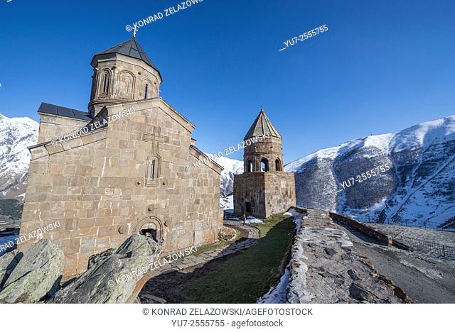 Famous Holy Trinity Church (Tsminda Sameba) from 14th century near Gergeti village, Stepantsminda town and Mount Kazbek in Georgia