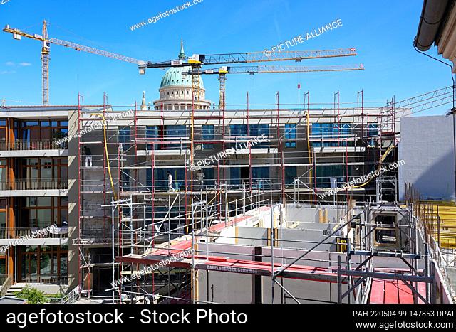03 May 2022, Brandenburg, Potsdam: The shell of the new synagogue (front, r) at Schlossstrasse No. 1 near the Old Market