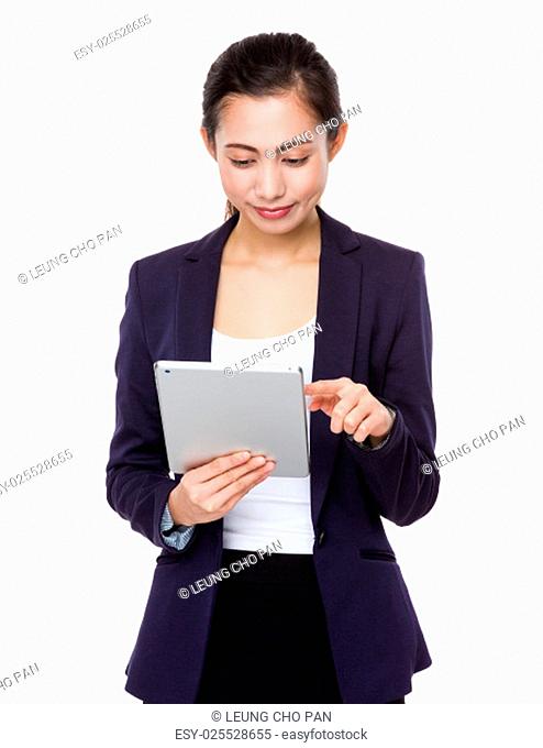 Young businesswoman use of tablet pc