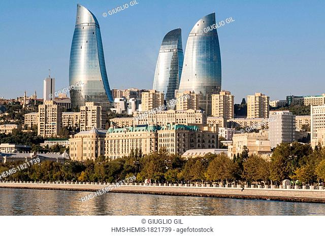 Azerbaijan, Baku, Flame Towers by architects Hellmuth, Obata & Kassabaum view from the edge of Caspian Sea along the Neftciler Prospekt avenue also called...