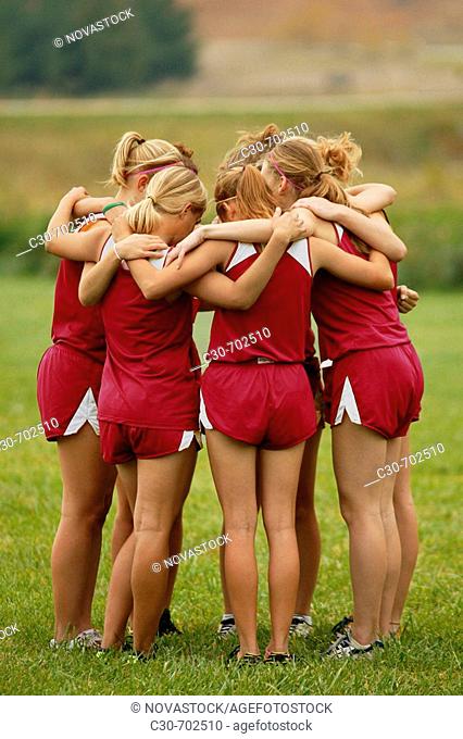 Teamwork, girls in huddle