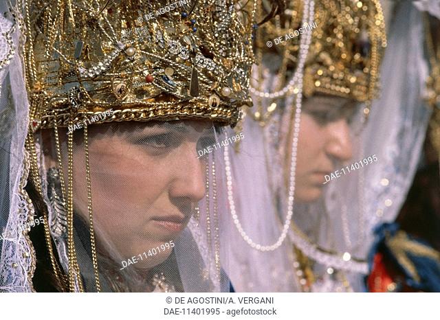 One of the Devout Women, detail of the face and the richly decorated headdress, representation of the Via Crucis (Way of the Cross), Holy Week, Marsala, Sicily