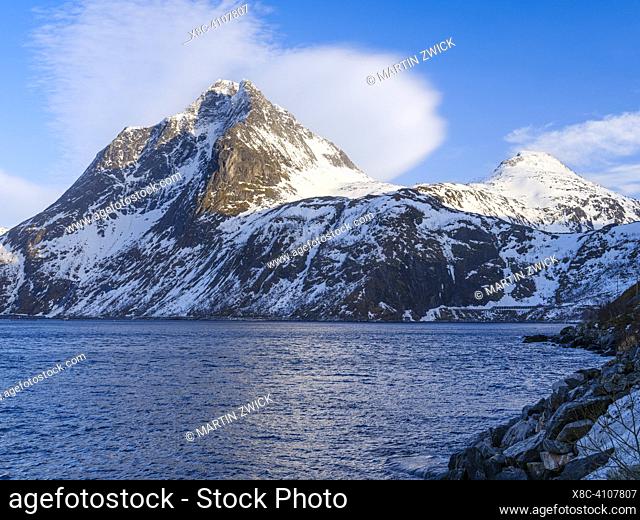 Landscape in Mefjorden, Mt. Breidtinden. The island Senja during winter in the north of Norway. Europe, Norway, Senja, March