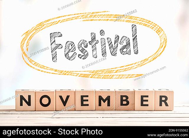 November festival sign with wooden blocks on a stage
