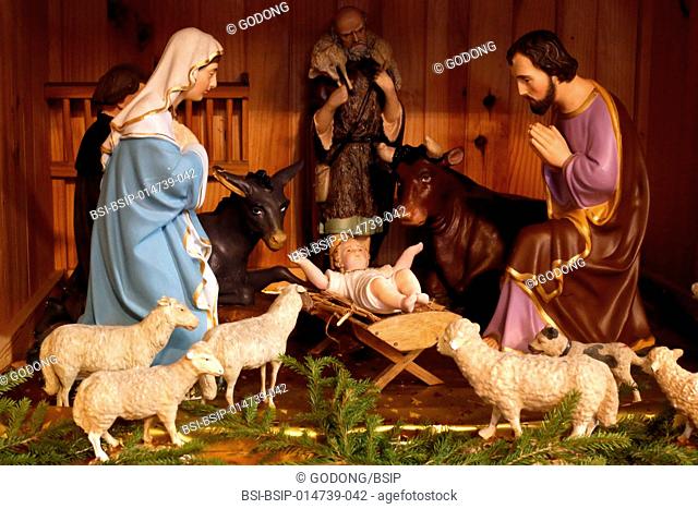 Christmas crib in a caholic church. Nativity scene. The holy Family