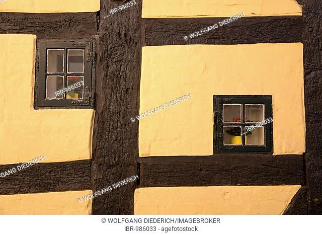 Small windows in a half-timbered house of St.-Johannis-Kloster, St. Johannis Monastery, Schleswig an der Schlei, Ostsee, Schleswig-Holstein, North Germany