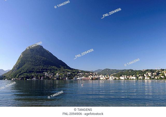 Town at waterfront, Monte San Salvatore, Lake Lugano, Switzerland