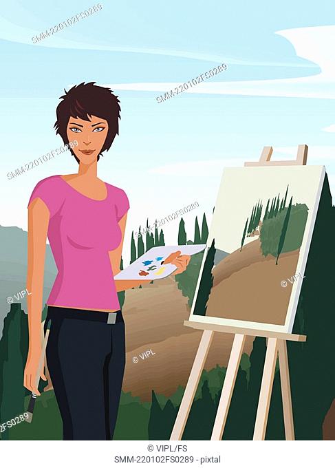 Woman holding paintbrush and palette