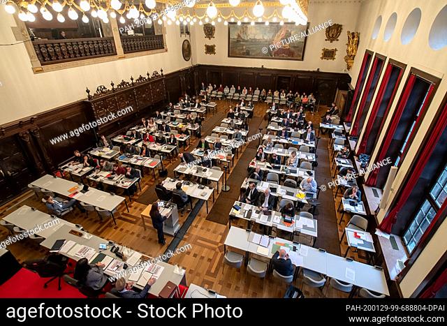 29 January 2020, Bremen: Members of the Bremische Bürgerschaft sit in the provisional plenary hall in the town hall. MEPs are debating, among other things