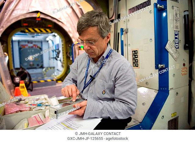 Canadian Space Agency astronaut Robert Thirsk, Expedition 2021 flight engineer, participates in a training session in an International Space Station...