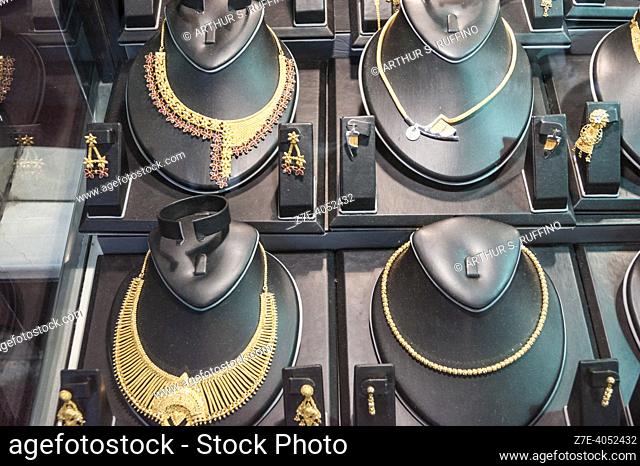 Deira Gold Souq. Detail of jewelry in shop windows. Dubai, United Arab Emirates, Middle East