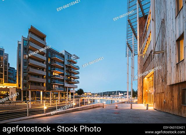 Oslo, Norway. Night View Of Residential Multi-storey Houses In Aker Brygge District. Summer Evening. Residential Area. Famous And Popular Place
