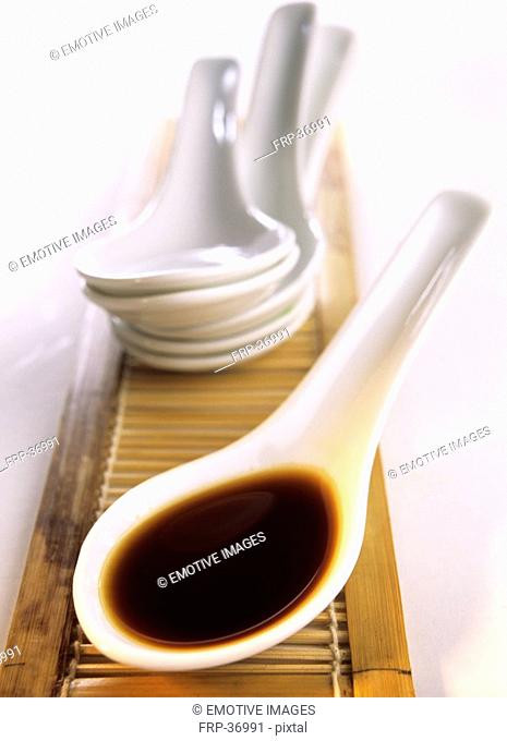 Asian spoon with soy sauce
